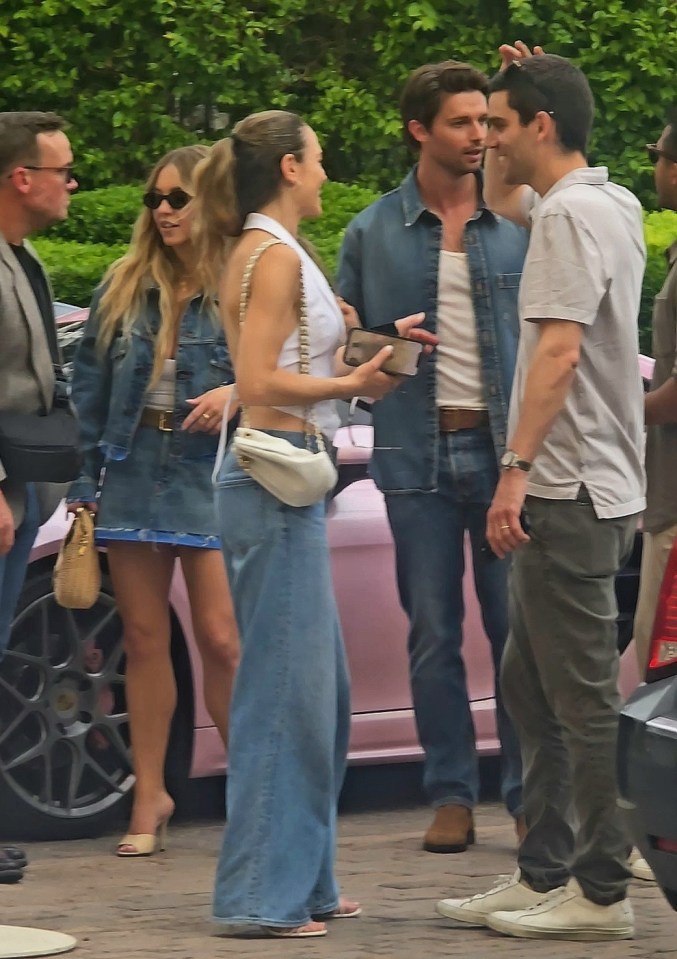 Sydney Sweeney and Patrick Schwarzenegger leaving an event together.