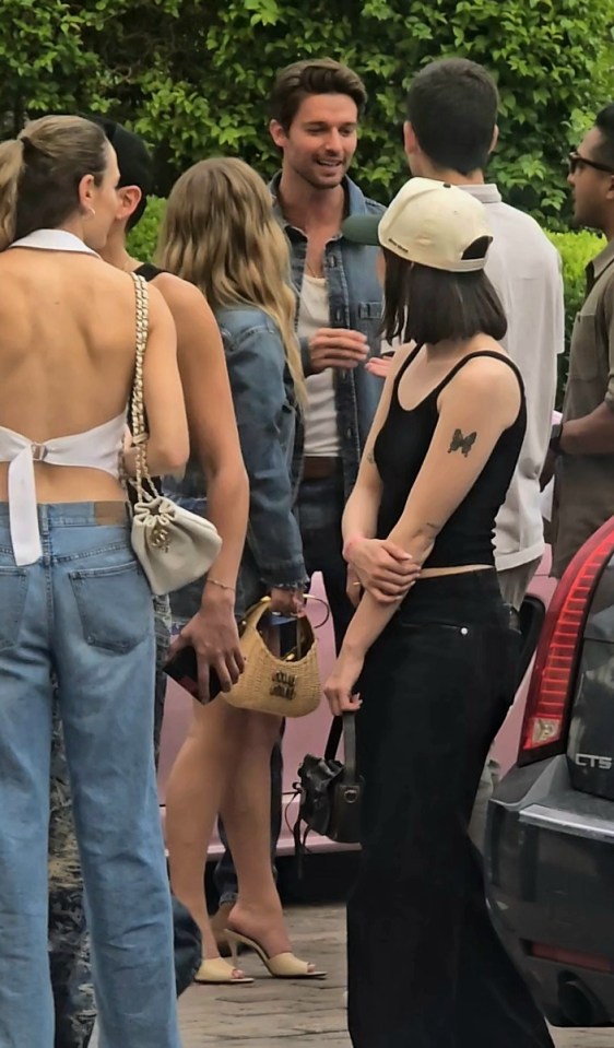 Sydney Sweeney and Patrick Schwarzenegger leaving an event together.