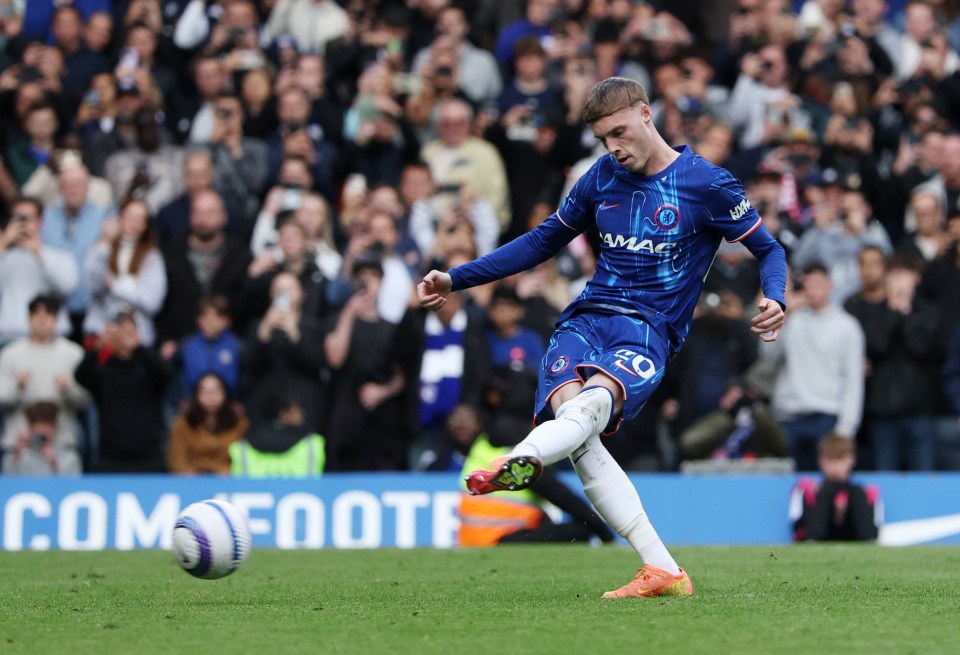 Cole Palmer of Chelsea scoring a penalty kick.