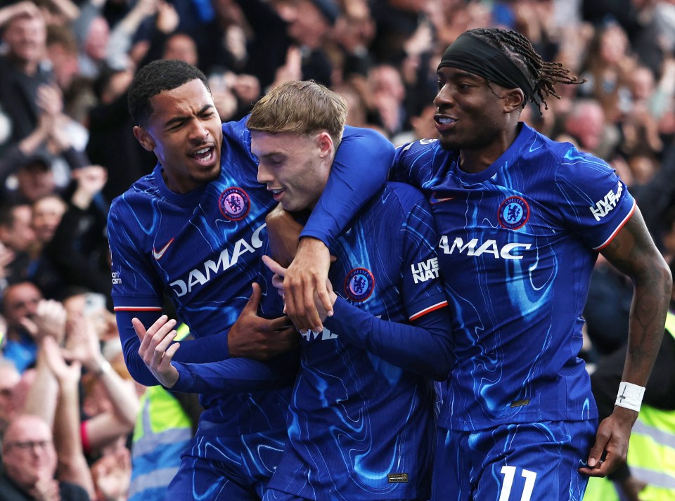 Chelsea players celebrating a goal.