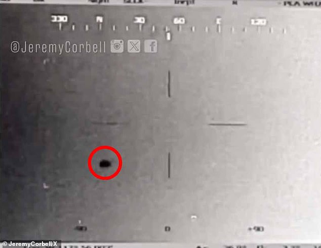 Two eerie UFOs have been caught on a US naval camera emerging from the ocean and taking off in a 'synchronized' flight off the coast of southern California. The above was captured in 2023, unrelated to Rogers' incident