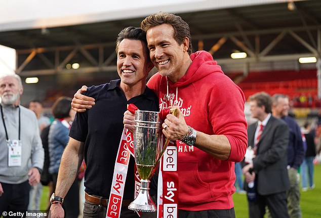 Reynolds, meanwhile, is in business with fellow Hollywood star Rob McElhenney (left)