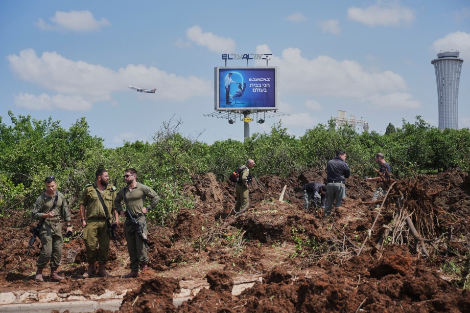 Israeli security forces inspecting a site near Ben Gurion International Airport.