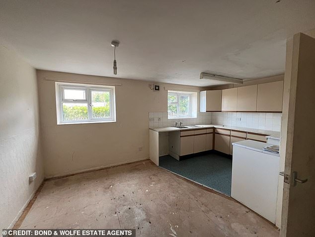 Even though they are advertised as an 'attractive price' the interiors show exposed floorboards and stained walls