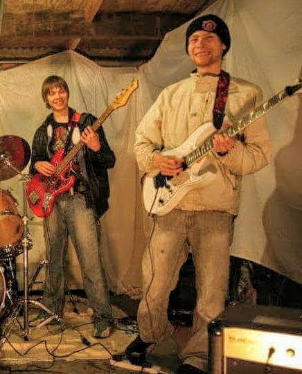 Careers, marriage, children: these are all the milestones his sons have missed, the 74-year-old retired school teacher said: 'It is very difficult'. Pictured: The boys rehearsing with their band Freaky Stiltskin and the Hot Rocks