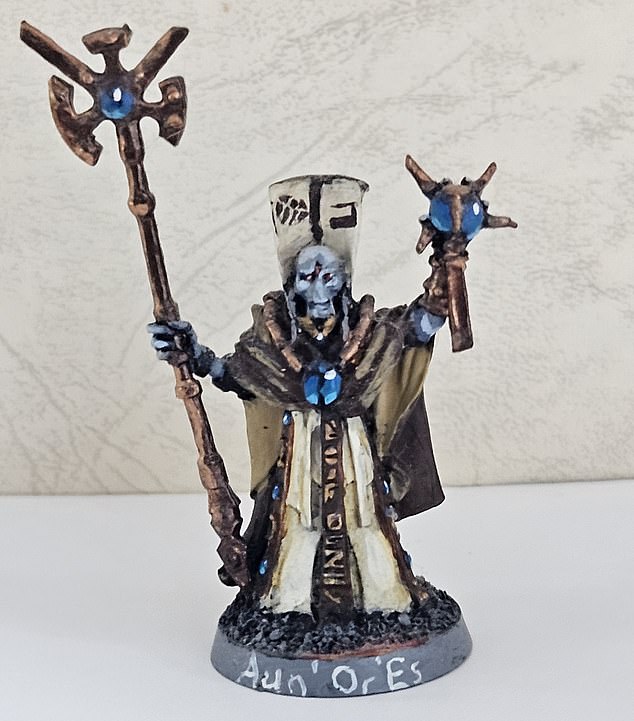 At the cremation and a later memorial service, the parents gave everyone a Warhammer figure, which Torin loved, telling them to take it on their next holiday and snap a picture for the Lakemans: 'They can go to places that the boys would have liked to go to'. Pictured: A figure painted by Torin