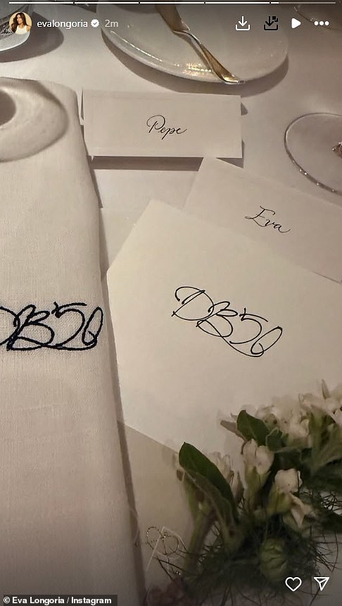 Place settings at the London dinner featured embroidered DB50 napkins, ina snap shared by the family's close pal Eva Longoria