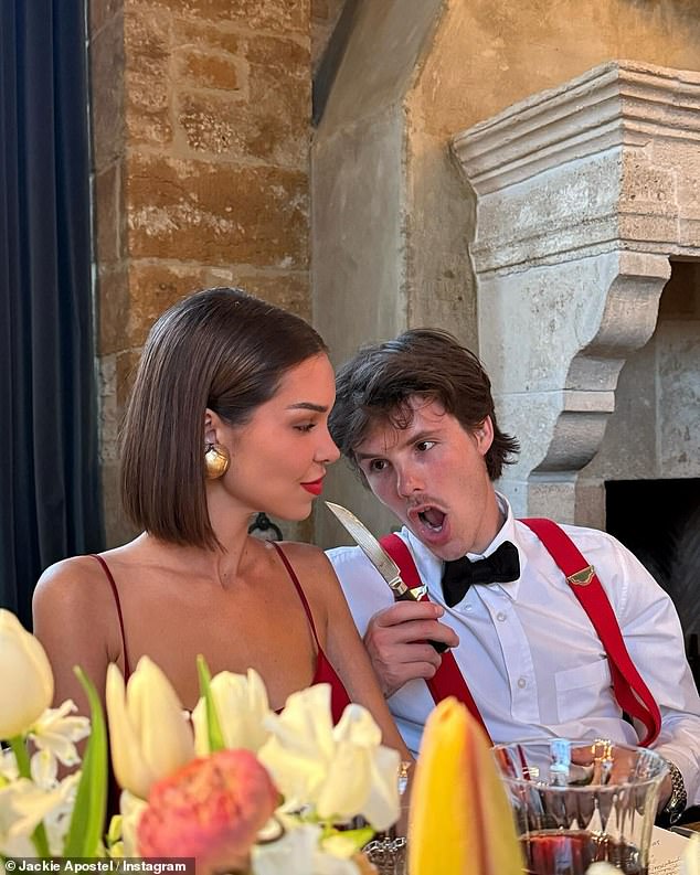 Cruz larked around with a knife at the table for the intimate family dinner which kicked off the celebrations