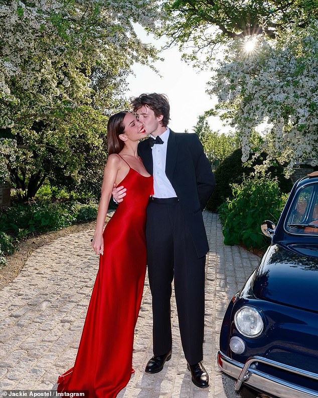 Cruz's girlfriend Jackie Apostel shared photos from the Cotswolds family bash, where she wowed in a red satin gown