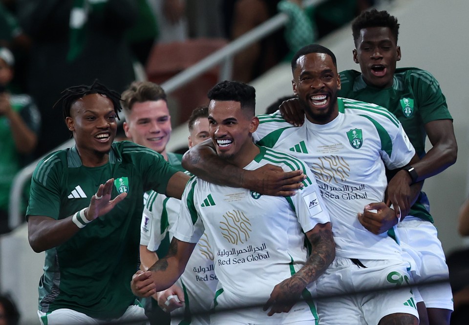 Al-Ahli Saudi players celebrating a goal.