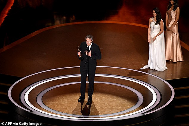 Brazilian director Walter Salles accepts the award for Best International Feature Film for "I'm Still Here" onstage during the 97th Annual Academy Awards