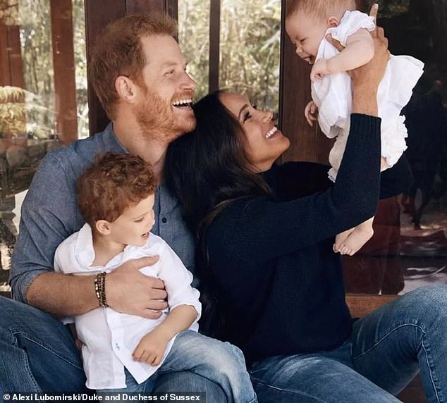Harry and Meghan are pictured with their children, Archie and Lilibet, in California