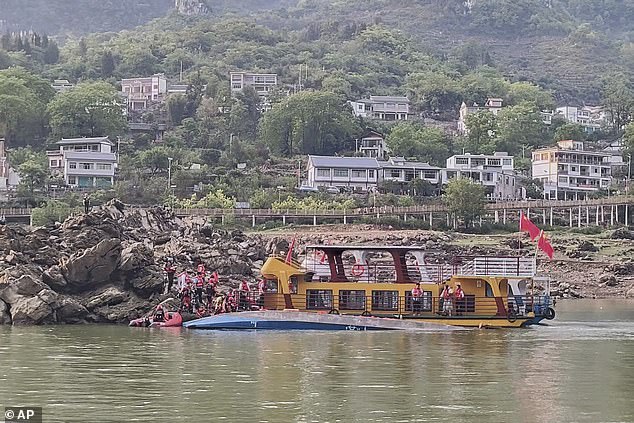 The report did not immediately offer further details about the type of attraction or the circumstances surrounding the incident. Pictured: The search operation underway