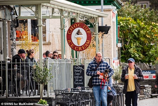 An ice cream parlour in Ambleside was enjoying a healthy trade when MailOnline visited last month