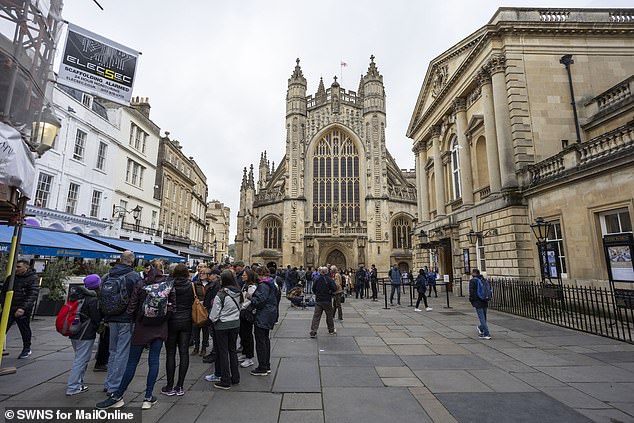 People gathered in the shadow of Bath Abbey and the Roman Baths late last month. Locals say it's impossible to get parked in the city