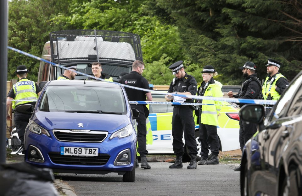 Police officers at a counter-terrorism raid.