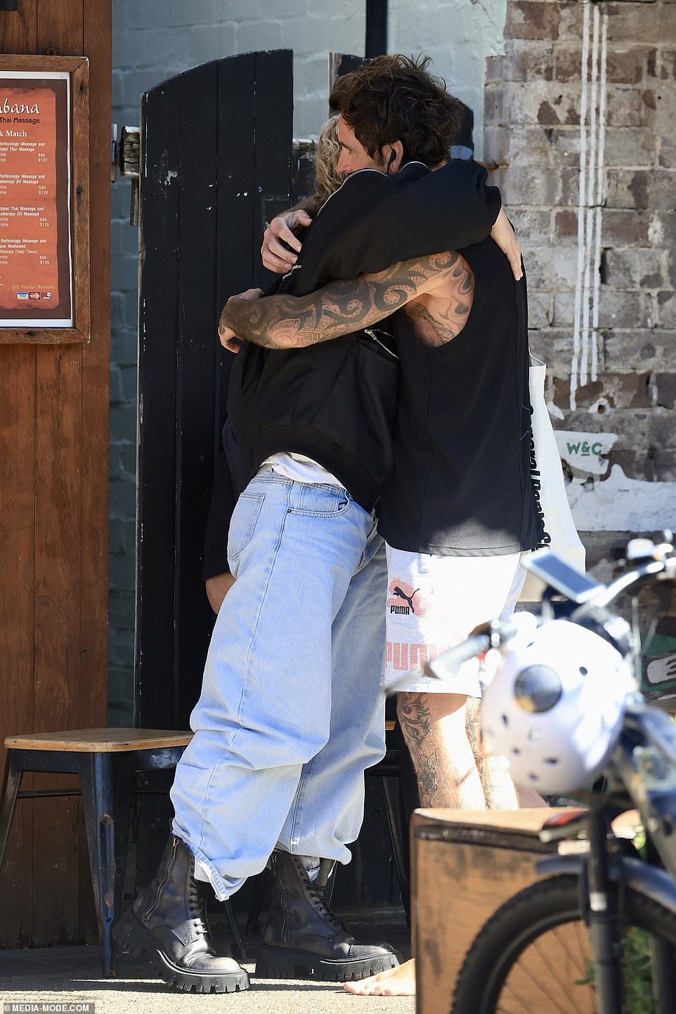 Kath appeared emotional as they were embraced by one friend while visiting popular Bondi café Gertrude & Alice