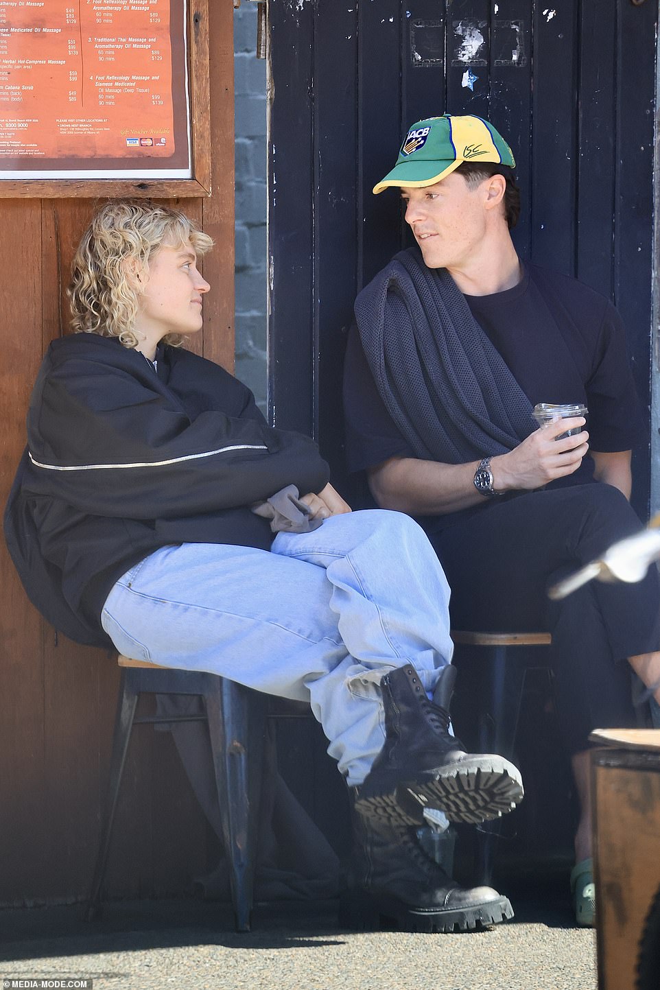 They were also joined by another male, who was seen enjoying a beverage at the café with Kat