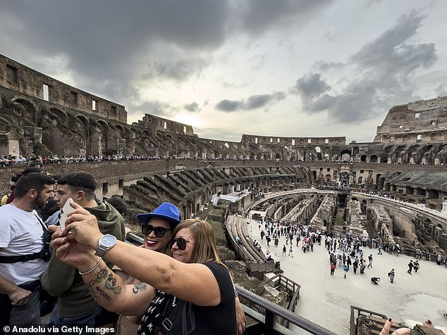 A local Rome newspaper noted how the man might have been trying to capture 'a closer view of the Colosseum, perhaps for an unforgettable selfie'