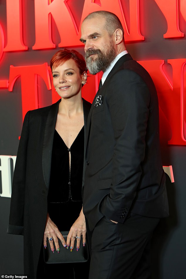 Lily and David separated late last year after Lily, 39, speculated that David was using Raya and shortly after The Mail revealed the Stranger Things star, 50, had been having an affair (pictured together December 2023 before she had cosmetic surgery)
