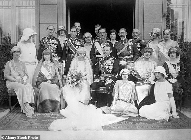 George VI, sixth from left, acted as best man at the wedding of Prince Paul of Serbia and Princess Olga of Greece and Denmark