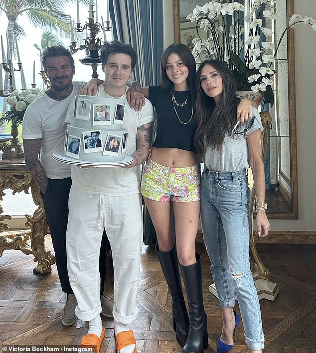 David and Victoria with their son and his wife Nicola Peltz on their first wedding anniversary