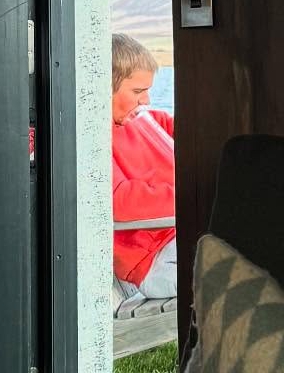 Justin Bieber appearing to smoke from a bong.