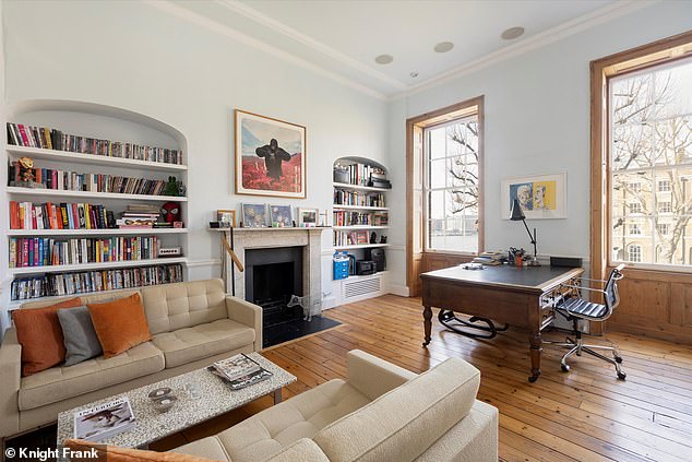 His upscale abode features double-height ceilings, five bathrooms and an internal patio courtyard garden