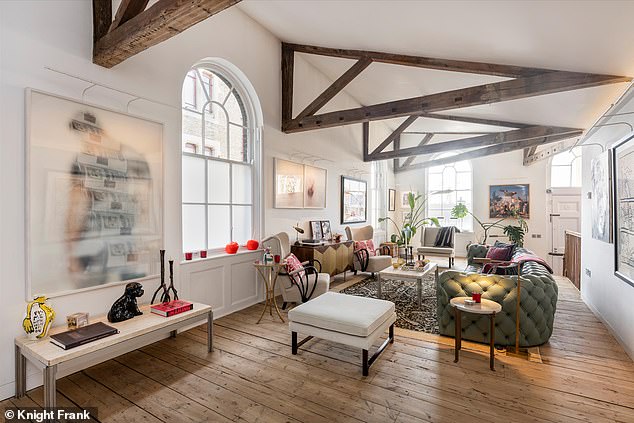 Sitting on the banks of the River Thames at Wapping in east London, the four-storey house features two reception rooms, views of the river as well as a riverside garden