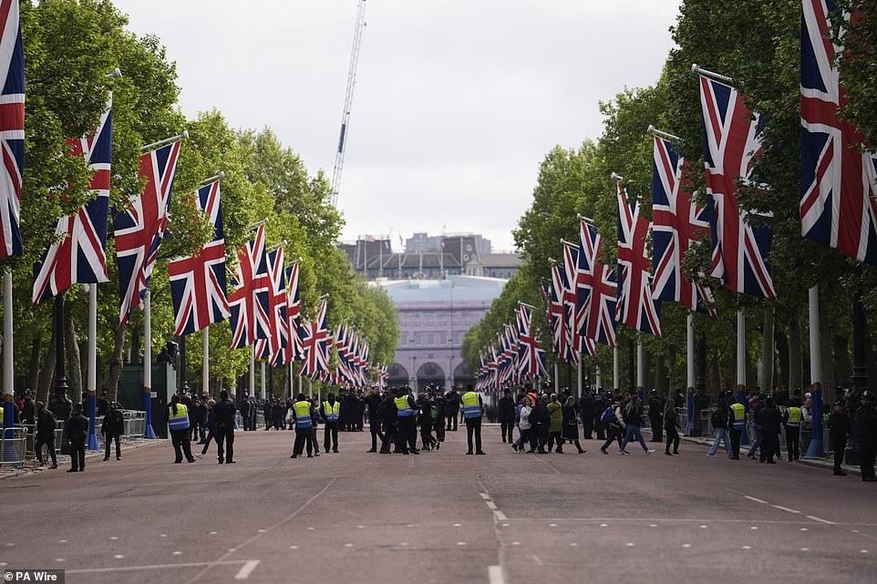 Union flags are flown ahead of the procession for the 80th anniversary of VE Day on The Mall near Buckingham Palace today