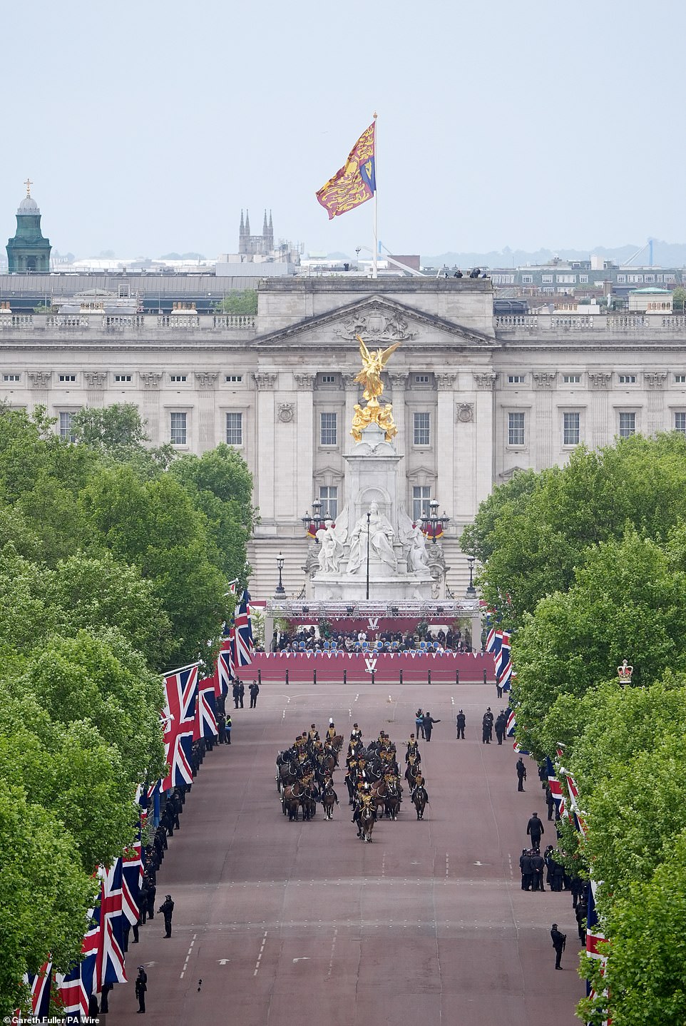 Members of the Royal Horse Artillery on The Mall ahead of a military procession marking the 80th anniversary of VE Day