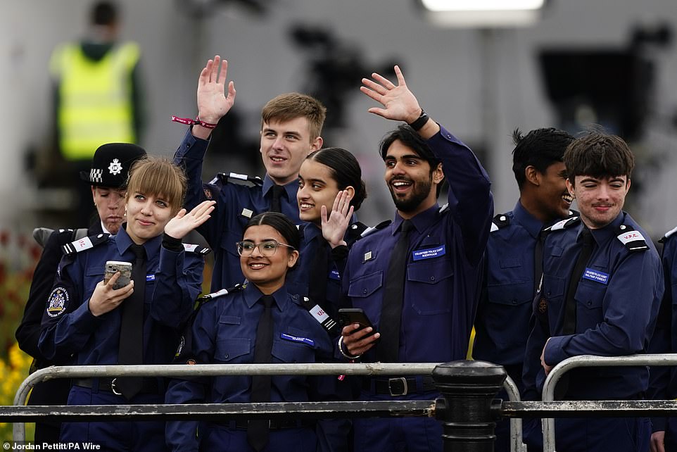 Volunteer police cadets gather ahead of the military procession marking the 80th anniversary of VE Day in London today