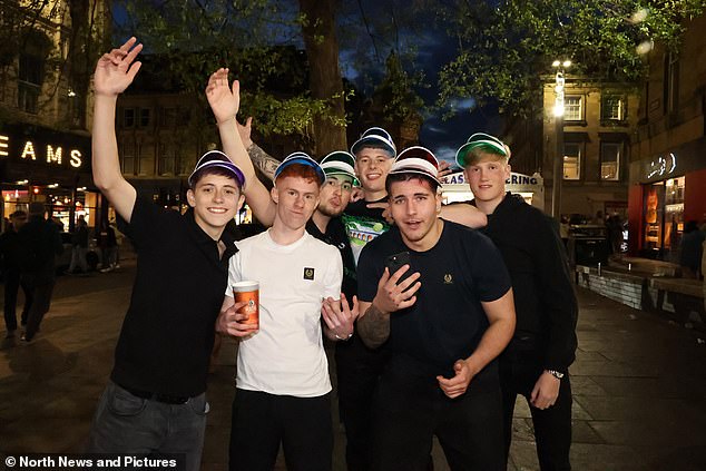 A group of male boozers were pictured donning crazy golf berets in Newcastle