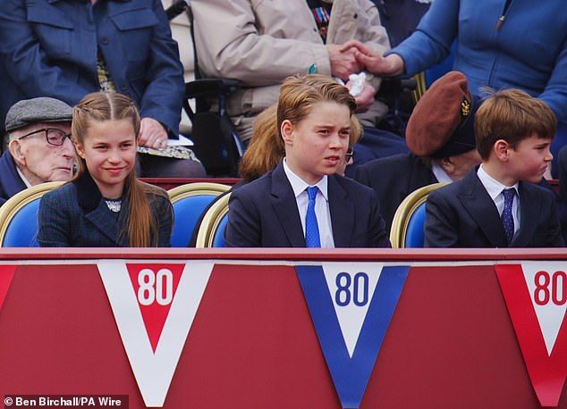 Louis, whose appearance marks his first in public since he turned seven, sat alongside his older siblings Charlotte, 10, and George, 11