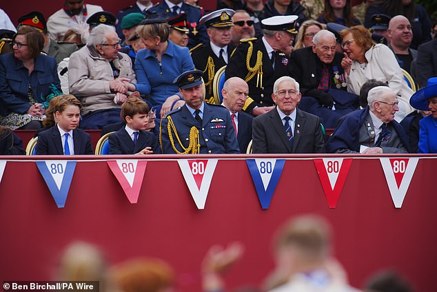 The Prince of Wales sat in the front row to watch the celebrations, flanked on his right by Prince Louis, seven, and Prince George, 11
