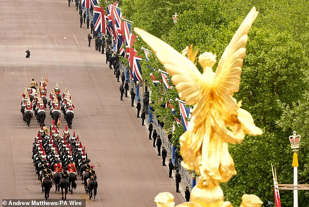 Members of the Household Cavalry on The Mall near Buckingham Palace in London this morning ahead of the procession