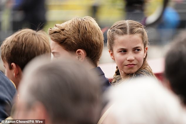The young princess who turned 10 on Friday wore her hair in braids as she sat alongside her brothers Prince Louis and Prince George