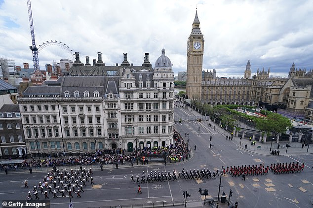 Members of the armed forces leaving Parliament Square during a procession marking the 80th anniversary of VE Day today