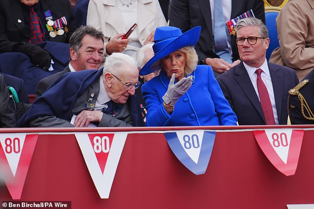 Veteran Jack Mortimer, Queen Camilla and Prime Minister Sir Keir Starmer during the military procession in London today