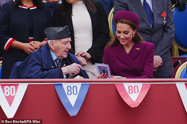 The Princess of Wales speaks to veteran Bernard Morgan during the procession for the 80th anniversary of VE Day today