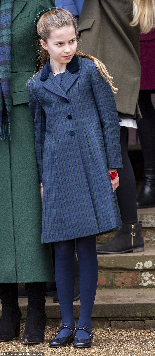 For today's VE Day celebrations, Charlotte, who recently celebrated her 10th birthday, rewore blue and green coat she picked for last year's Christmas morning service in Sandringham. Pictured: Charlotte during the royal family's Christmas celebrations last December