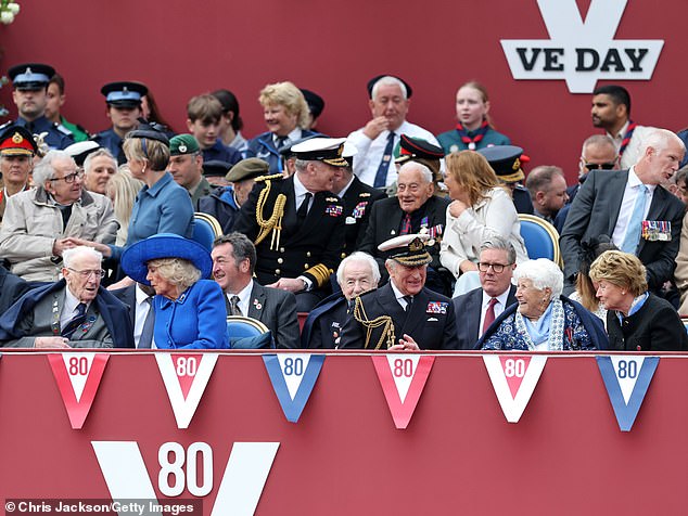 Queen Camilla, King Charles III and Prime Minister Keir Starmer during the military procession to mark VE Day 80 today