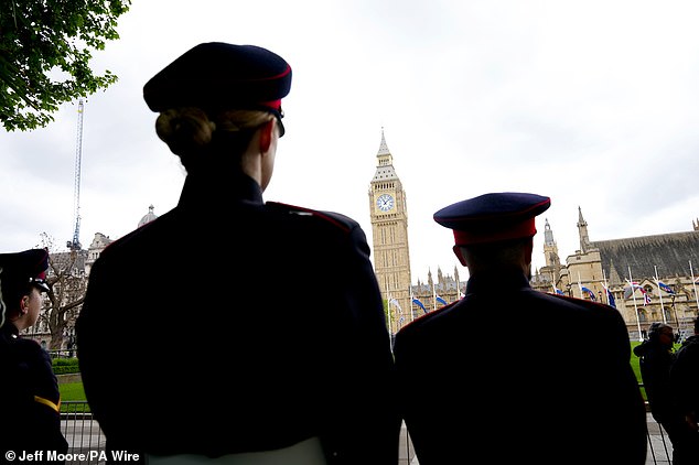 Military personnel near Parliament Square today ahead of the procession marking the 80th anniversary of VE Day today