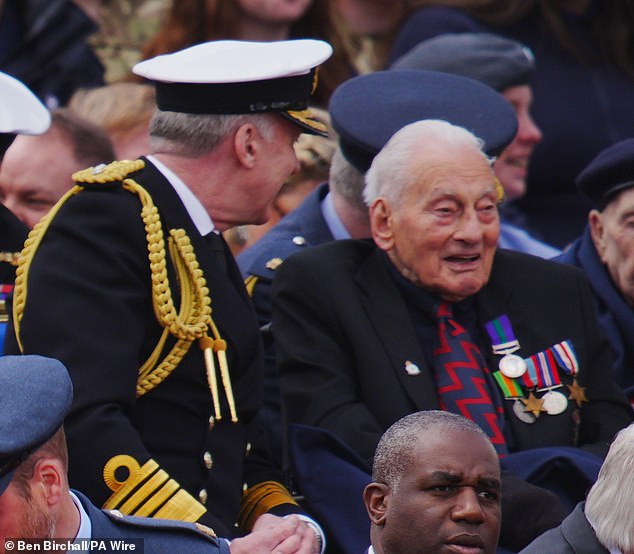 Charles Auborn, 99, joined the Army aged 18 in 1944 and served as a gunner. Above: Seated next to Royal Navy chief Admiral Sir Tony Radakin today