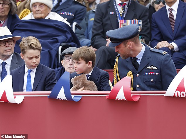 Prince Louis seen clutching a fuzzy brown hot water bottle on what has been a significantly colder, overcast day in London than the past week, with temperatures plummeting to 14 degrees