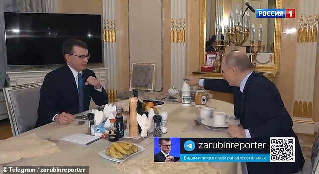 Putin's home is adorned with gilded walls, large gold-framed mirrors and gold chandeliers