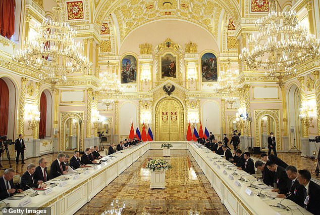 Pictured: President Xi Jinping (L) and Russian President Vladimir Putin (R) seen during their talks at the Grand Kremlin Palace, on March 21, 2023