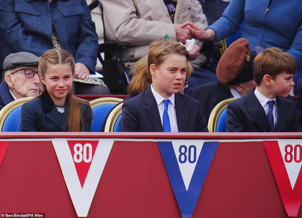 Louis, whose appearance marks his first in public since he turned seven, sat alongside his older siblings Charlotte, 10, and George, 11