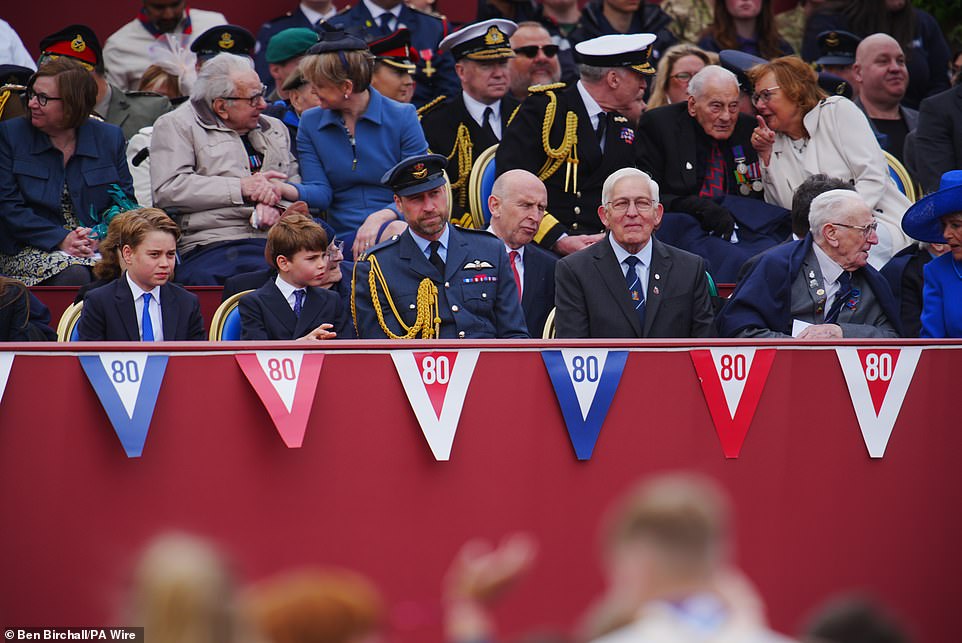 The Prince of Wales sat in the front row to watch the celebrations, flanked on his right by Prince Louis, seven, and Prince George, 11