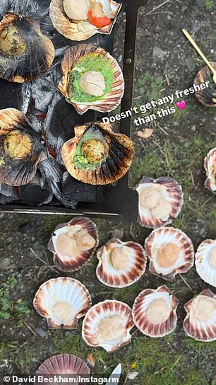 Sharing photos of them having dinner, proud dad David showed his sons preparing the seafood before cooking it on a BBQ outside